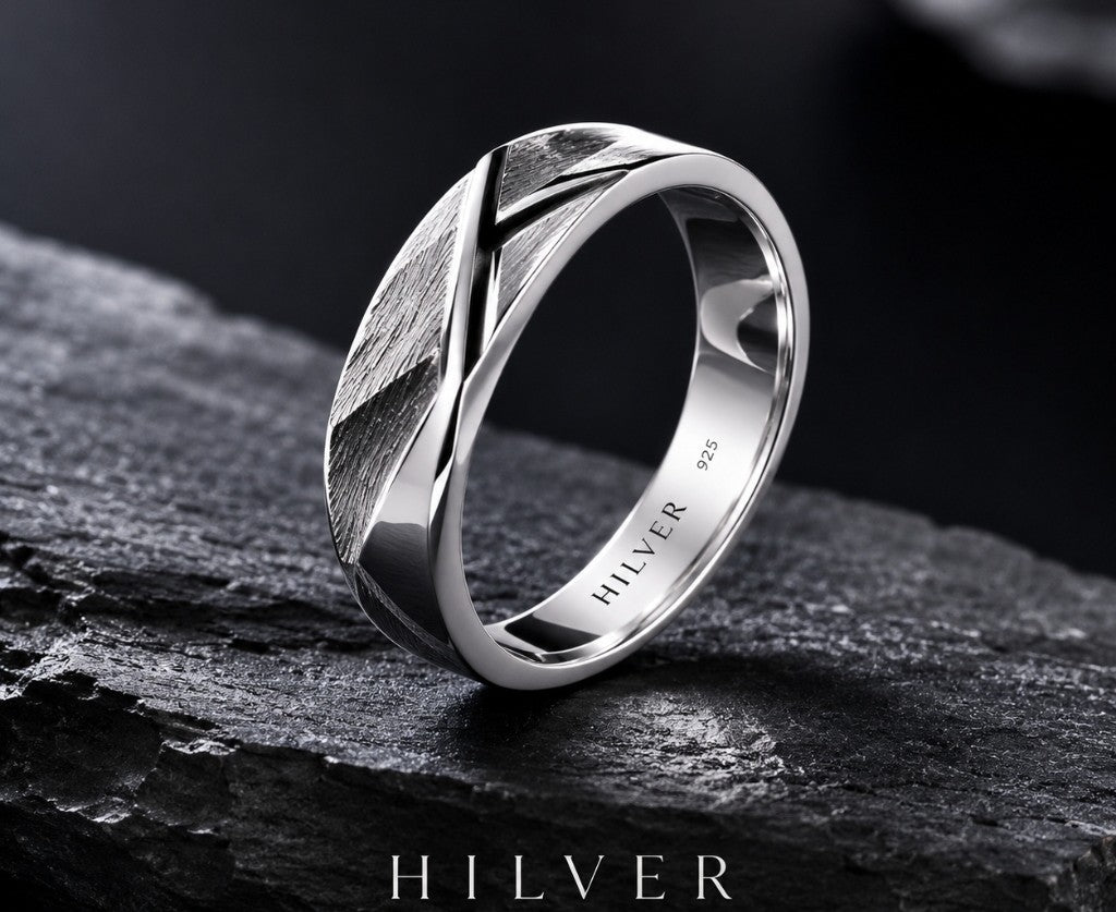 Hilver handcrafted 925 sterling silver ring on textured slate