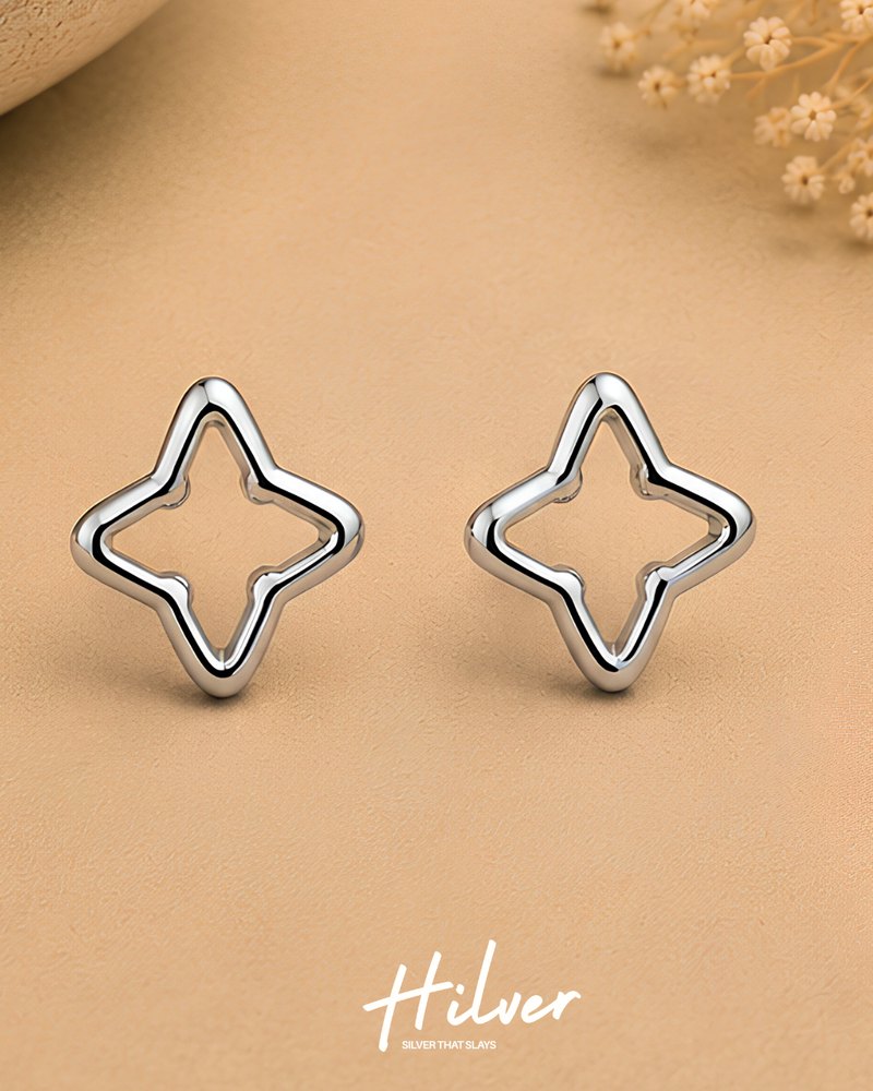 Silver Four-Pointed Starburst Outline Stud Earrings, view 1