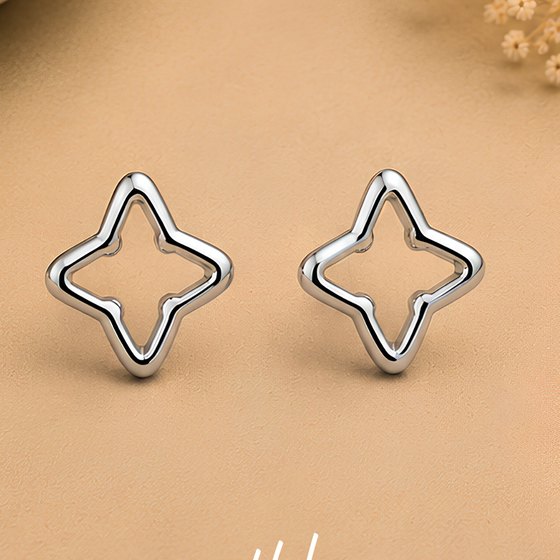 Silver Four-Pointed Starburst Outline Stud Earrings